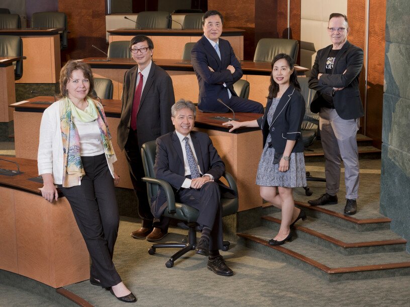 Project team members, including (from left): Dr Margarita Pavlova (Deputy Team Leader); Professor John Lee Chi-kin (Team Leader); Professor Tsui Kwok-tung (Associate Team Leader); Professor May Cheng May-hung (Associate Team Leader) and Professor Kerry Kennedy (Member and Contact Point), pose for a photo with President Professor Stephen Cheung Yan-leung.