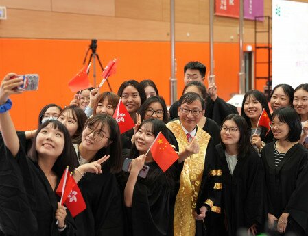 The ceremony is attended by around 1,000 students and teachers from the University, JCPS, and ECLC