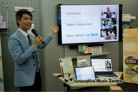 Dr Michael Leung from Innovative Music Zentre Ltd introduces their e-Orch music education project at the CEAR opening ceremony, which transforms tablets into musical instruments, driving innovation in AI-powered e-orchestra and music education