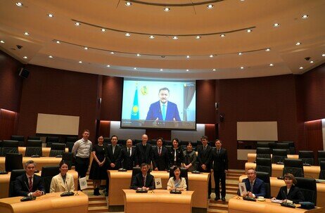 Group picture of all attendees at the signing ceremony, which is graced by a video message from Mr Sayasat Nurbek, Minister of Science and Higher Education of the Republic of Kazakhstan