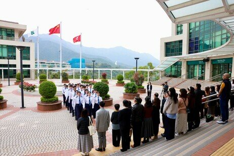 The national, regional and university flags are raised by a team made up of EdUHK students