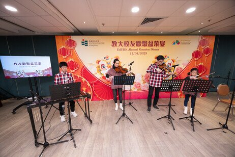 Alumna Ms Chan Ying-tim with her family, after performing a chamber quartet together