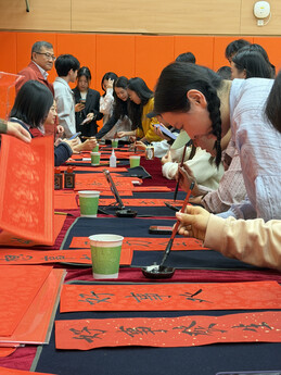 The Graduate School’s Lunar New Year celebration fills the air with the fragrance of ink