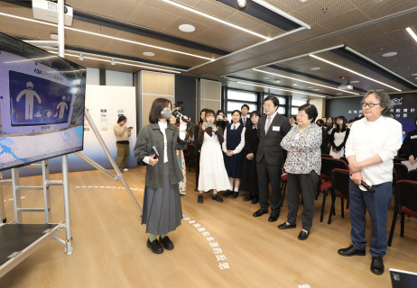 Guests tour the student works exhibition