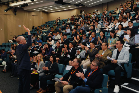 Professor John Clifford Mitchell engages with the audience