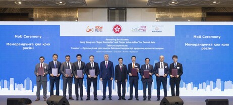 Professor Bill Yeung Chi-ho (1st right), Dean of Students at EdUHK, signs an MoU with the Hong Kong Telecom under the witness of Mr John Lee (5th right), the Chief Executive of HKSAR, and H.E Serik Zhumangarin (6th right), Deputy Prime Minister and Minist