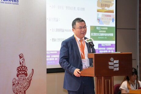 Mr Ng Wun-kit, Principal of Pui Kiu Middle School, delivering a speech